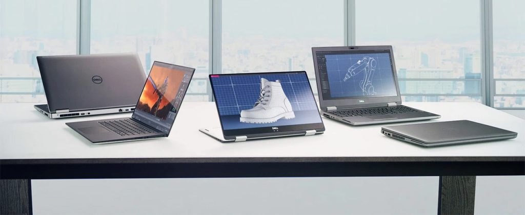 Fünf Dell Precision Notebooks auf einem Tisch
